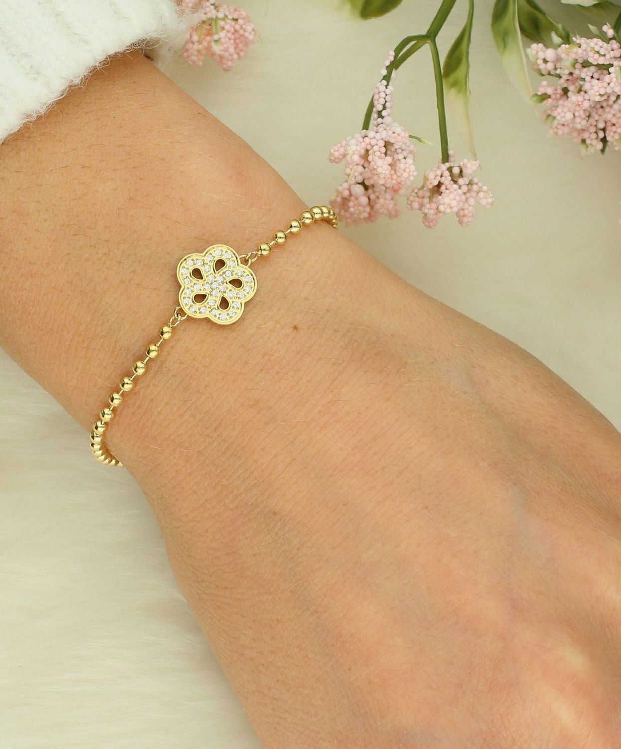 Bransoletka Nomination stalowa Italy Soffio d'amore pozłacana kwiatek z białymi cyrkoniami 134006 059.png